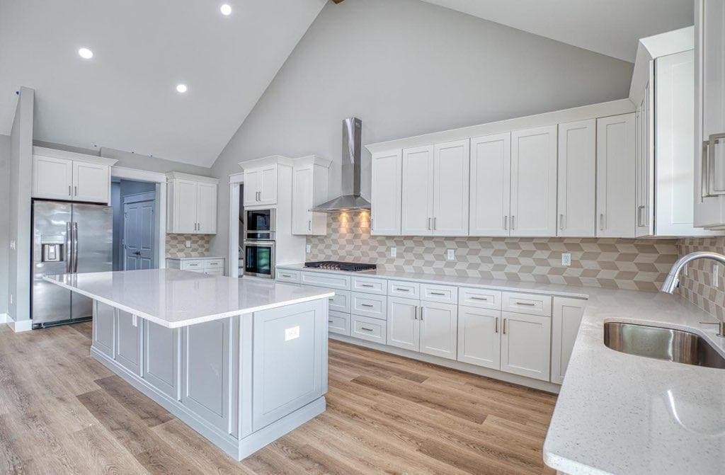 Custom-designed white kitchen cabinets by Southern Cabinets in Conway, SC